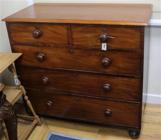 A late Victorian mahogany chest of two short and three long drawers W.107cm